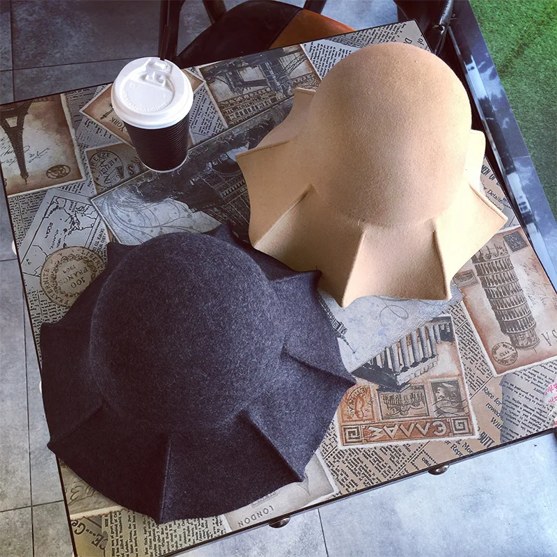 

Hat female autumn and winter foldable retro dome ruffled woolen hat wavy side felt hat Korean version of the fisherman hat