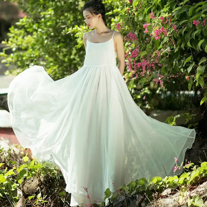 white flowing beach dress