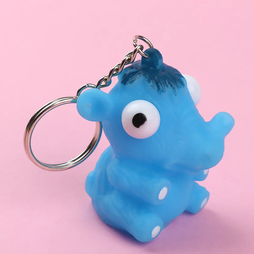 Keychain Schlüsselanhänger Squeeze Spielzeug Out Augen Puppe Stress Relief. 