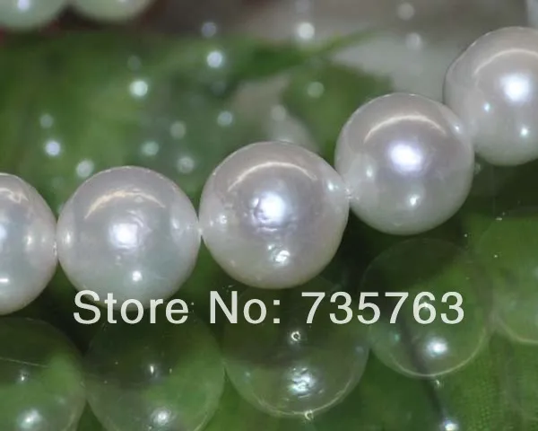 

xiuli 000138 Natural Rare white AAA12-13mm very luster round furrow nuclear pearls