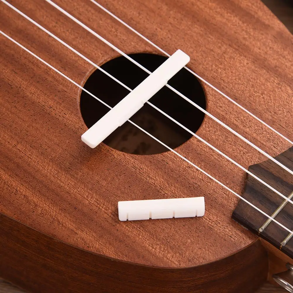 Buy Ukulele Guitar Bone Bridge Saddle Nut Set Slotted for Uke Guitar Stringed