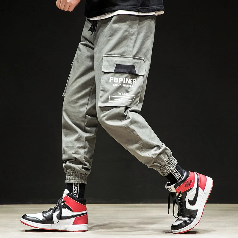 Мужские штаны для бега с несколькими карманами, эластичные штаны-шаровары, обтягивающие штаны в стиле хип-хоп, повседневные мужские брюки для бега, армейские брюки-карго - Цвет: Grey K107