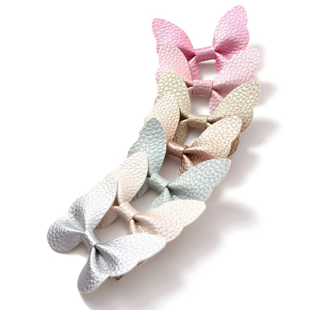 

7pcs/lot Infant Bow Baby Hair Clip Hair Pin for Girls PU Leather Butterfly Hair Accessories 7 Colors JFNY040