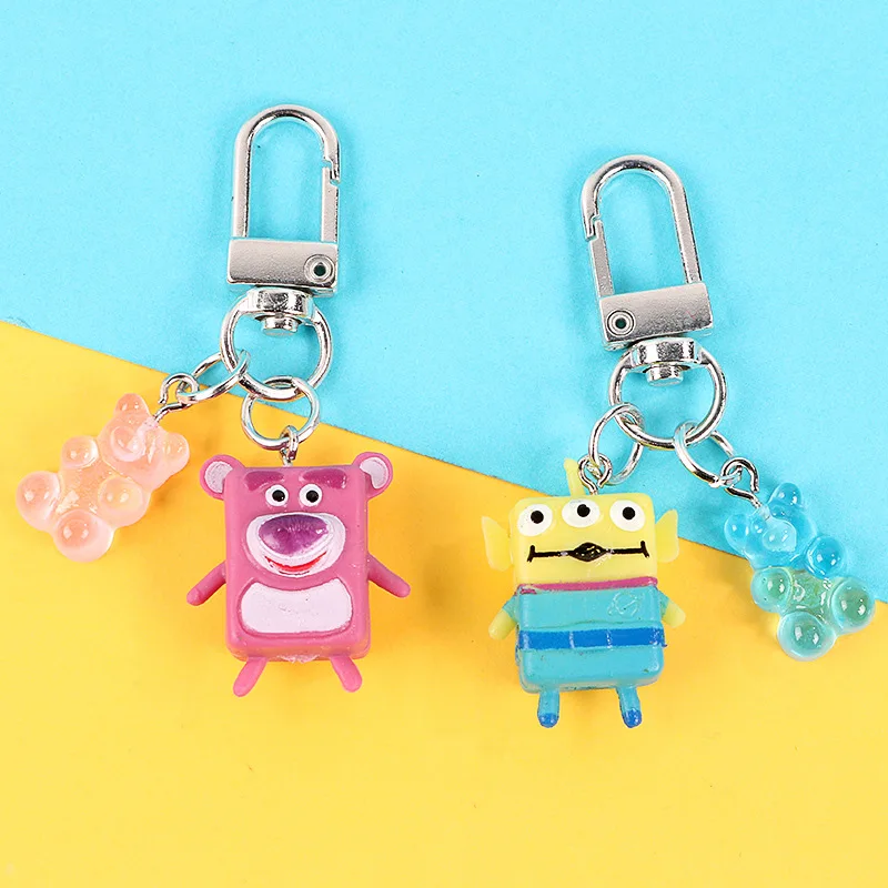 

movie keychain buzz lightyear woody strawberry bear action toy figure keychain 3eyes alien doll model keyring pandant