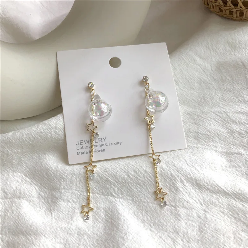 

Dream clear glass ball geometry earrings female Korean temperament long zirconium star Tassel ear nail ear clip 770