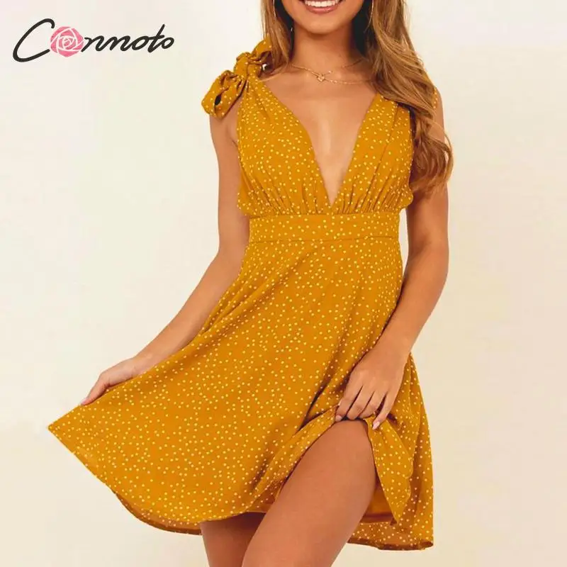 

Conmoto Polka Dot Sexy Deep V Summer Beach Dress Casual Mini Women Dresses Backless Ruffle Bow Short Dress Vestido