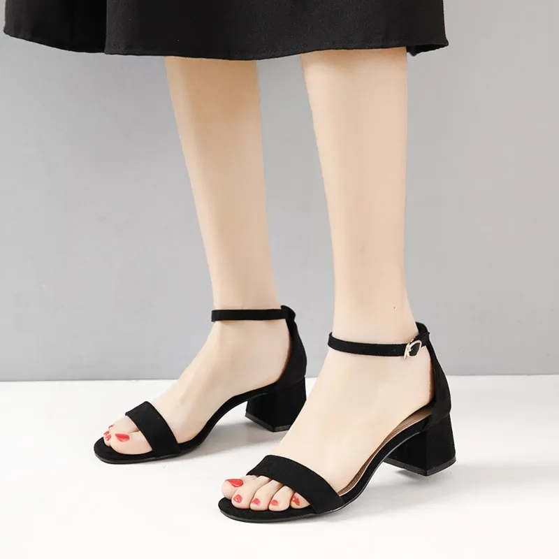 

Women open their toes with chunky heels for party dress sandals
