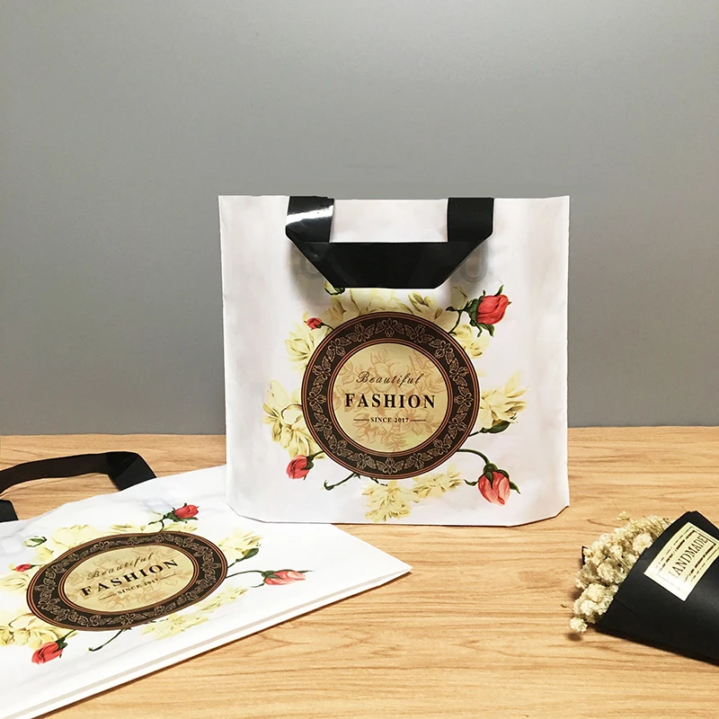 

50pcs Thicken Plastic Handle Bags Fashion Clothing Gift Shopping Bag