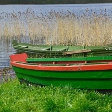 Colorful Canoe by Lake  Trakai  Lithuania I Poster Print by Keren Su (17 x 11)