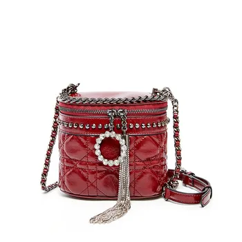 

2020 new designer bucket bag round tassel fashion luxury cowhide women's bag one shoulder slant span portable women's bag