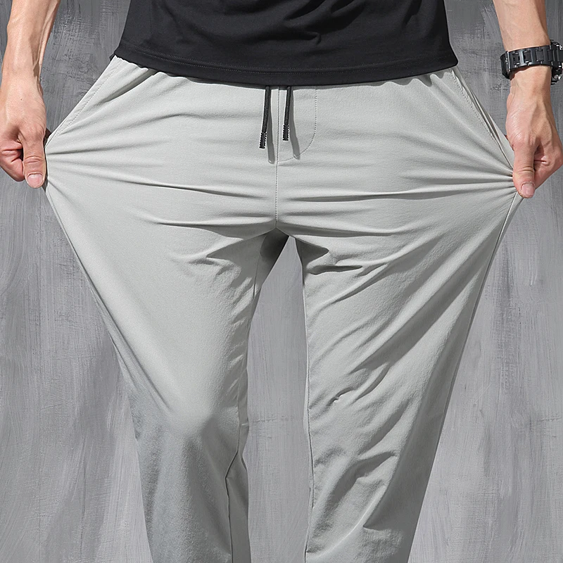 2025 New Korean Ice Silk Elastic Trousers Four Seasons Thin Casual Men'S Loose 9-Point Large Size Small Foot Sports Pants Spring 4