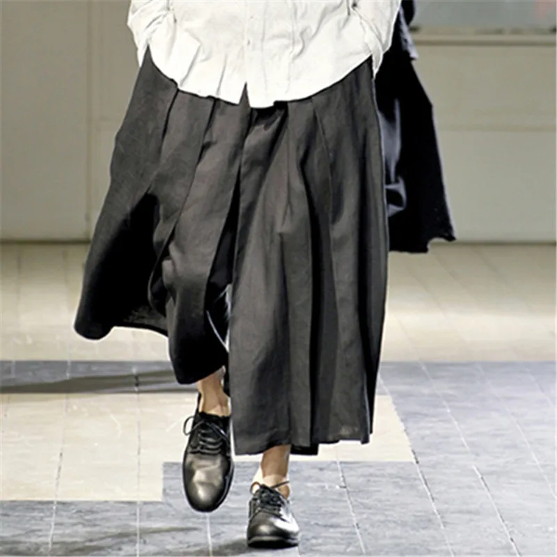 27-44 Big yards men's trousers Male culottes wide leg fluid boot cut casual pants plus size The singer's clothing
