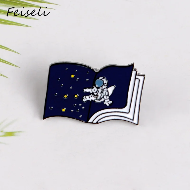 

Feiseli Cartoon Astronaut Soaring Space Book Brooch For Women Men Vintage Enamel Shirt Collar Corsage Metal Lapel Pins Badge