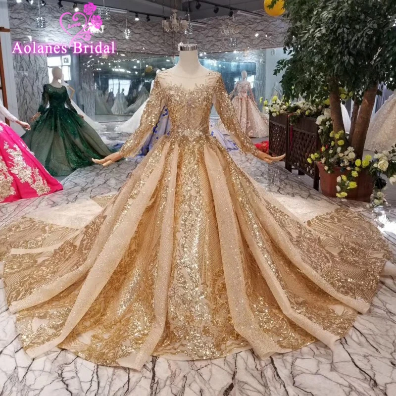 

2019 Boat Neck Lace Up Gold Lace Wedding Dress New Custom Pattern Chapel Train Saudi Arabia Elegant Long Sleeves Bridal Gowns