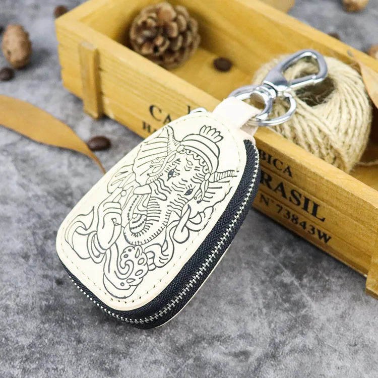 

Guangzhou Import Skeleton-skin Genuine Leather Creative Elephant Head God Craft Embossed Car Smart Key shu gao pi