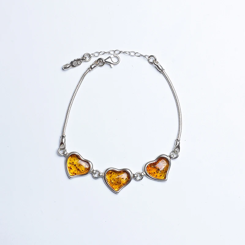 

Natural raw ore beeswax amber blood Perfume Panduobao group sterling silver bracelet hand-polished holiday birthday gift