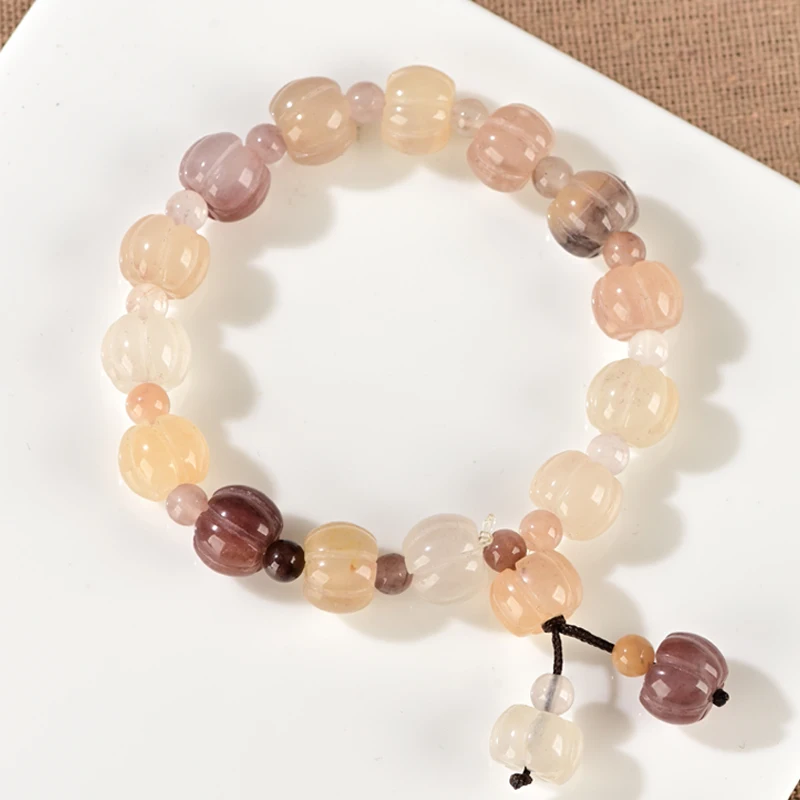 

Natural Gold Silk Jade Violet Pumpkin Pearl Jade Pink Bracelet Men's and Women's Fashion Originality Carving 10 * 12mm