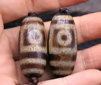 

pair of energy Tibetan Old Oily Agate 2 eye totem dZi Bead 40*20mm