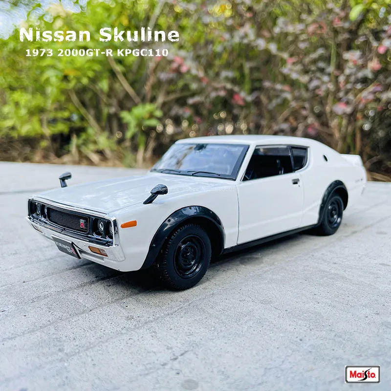 ΠΠΎΠ΄Π΅Π»Ρ Π°Π²ΡΠΎΠΌΠΎΠ±ΠΈΠ»Ρ Maisto 1:24 1973 Nissan Skyline 2000GT-R KPGC110, Π»ΠΈΡΡΠ΅ ΠΏΠΎΠ΄ Π΄Π°Π²Π»Π΅Π½ΠΈΠ΅ΠΌ ΠΠΎΠ΄Π΅Π»Ρ Π°Π²ΡΠΎΠΌΠΎΠ±ΠΈΠ»Ρ Maisto 1:24 1973 Nissan Skyline 2000GT-R KPGC110, Π»ΠΈΡΡΠ΅ ΠΏΠΎΠ΄ Π΄Π°Π²Π»Π΅Π½ΠΈΠ΅ΠΌ