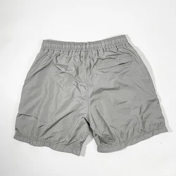 Shorts en nylon pour hommes et femmes, de haute qualité, lustre métallique, pantalons de plage décontractés, respirants pour couple 