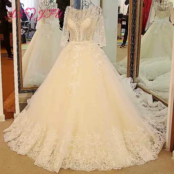 

AXJFU luxury princess beading diamond white flower lace wedding dress vintage handmade o neck illusion bow wedding dress 134