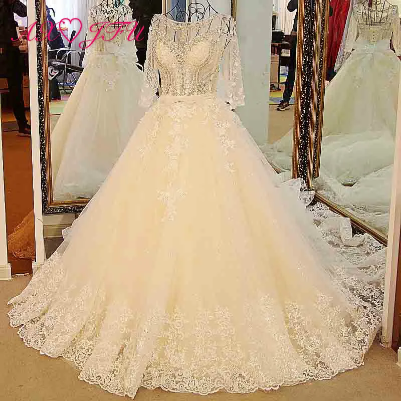 Axjfu Luxe Prinses Kralen Diamant Witte Bloem Kant Trouwjurk Vintage Handgemaakte O Neck Illusion Boog Trouwjurk 134 Axjfu Luxe Prinses Kralen Diamant Witte Bloem Kant Trouwjurk Vintage Handgemaakte O Neck Illusion Boog Trouwjurk 134