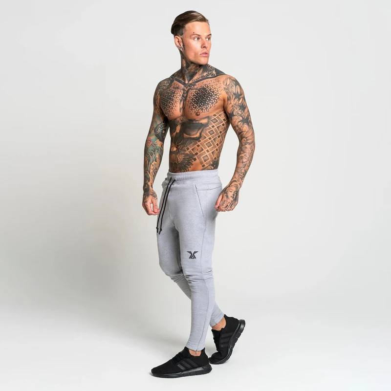 Новые популярные мужские спортивные штаны jogger модные спортивные штаны уличная облегающие спортивные брюки мужские повседневные брюки