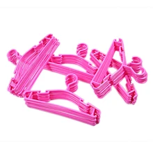 Розовый цвет набор из 50 штук вешалки для ребенка и ребенка в пластиковой прочной пластиковой вешалки крюк для девочки или мальчика 27x15 см