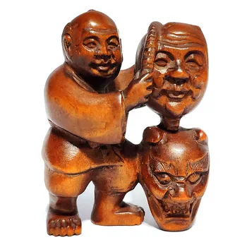 

Y6803 - 2" Hand Carved Boxwood Netsuke : Elder Man Selling Masks