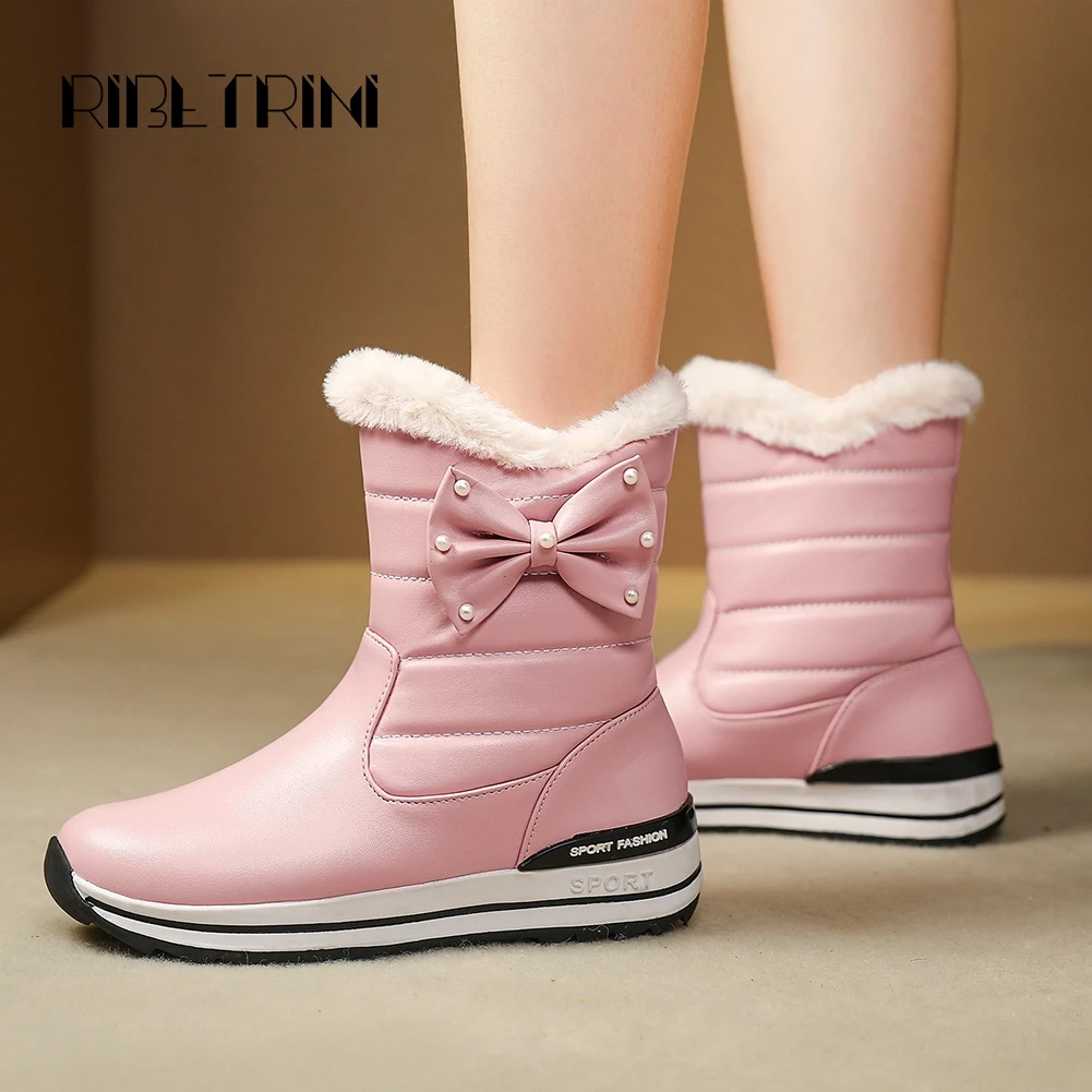 

RIBETRINI Women Snow Boots Fashion Thick Flat Heel Winter Warm Fur Lining Waterproof PU Shoes Woman Slip On Bowtie Ankle Boots