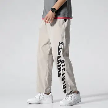 

Streetwear Sports Pants Men Loose Pants Lanterns Beam Feet Casual Trousers Wild Basketball Straight Tooling Gray Guard Pants
