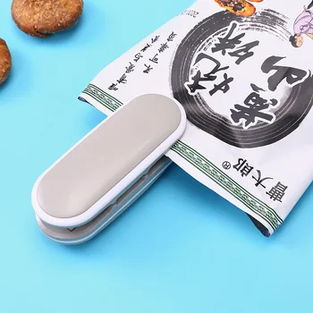 

Mini Portable Hand Pressing Type Sealing Machine Plastic Bag Packaging Small Household Snacks Closure Plastic Sealing