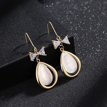 

2020 Summer New Style Opal Water Droplet Earrings Style Retro Golden Ear Hook Simple Small Bow Ear Stud