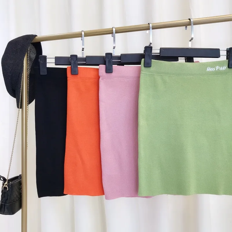 Женская трикотажная Мини-юбка ярких цветов, короткая юбка с буквенным узором, эластичная талия, облегающая юбка для девочек в Корейском стиле, сексуальные женские юбки B61