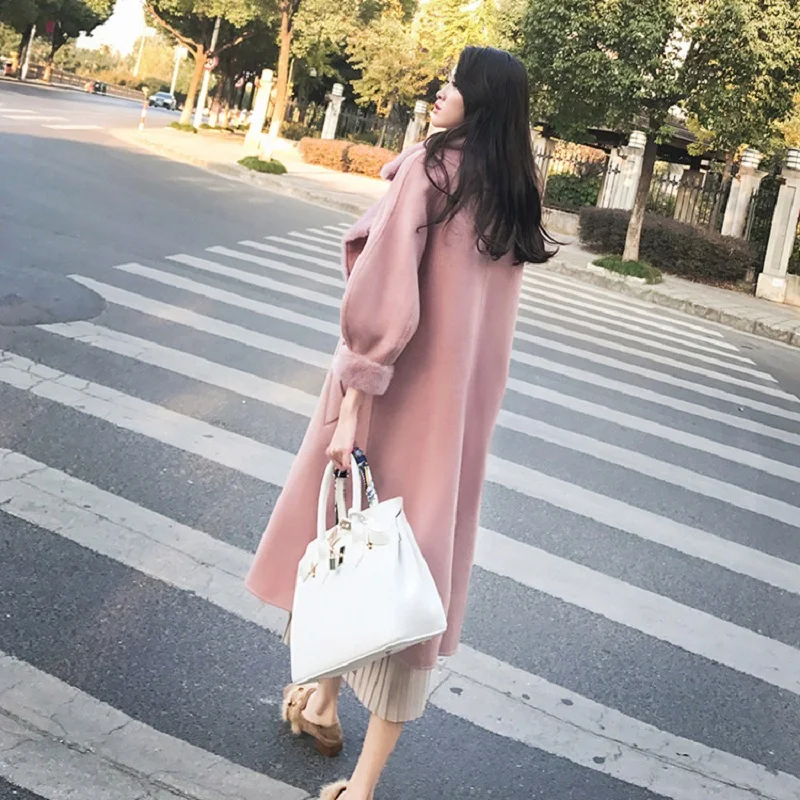 autumn and winter new Korean women's fashion lapel long-sleeved single-breasted tie belt waist long section Thicken woolen