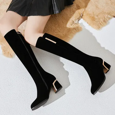 

Winter high heels for women with frosted boots and pointed toes