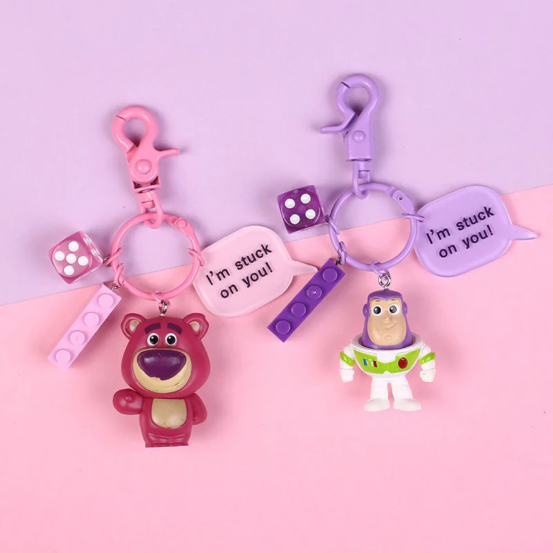 

Toy Story Strawberry Bear Woody Buzz Lightyear Keyring Cute Alien Action Figure Dolls Keychain Keyring Pendant Cake Decoration