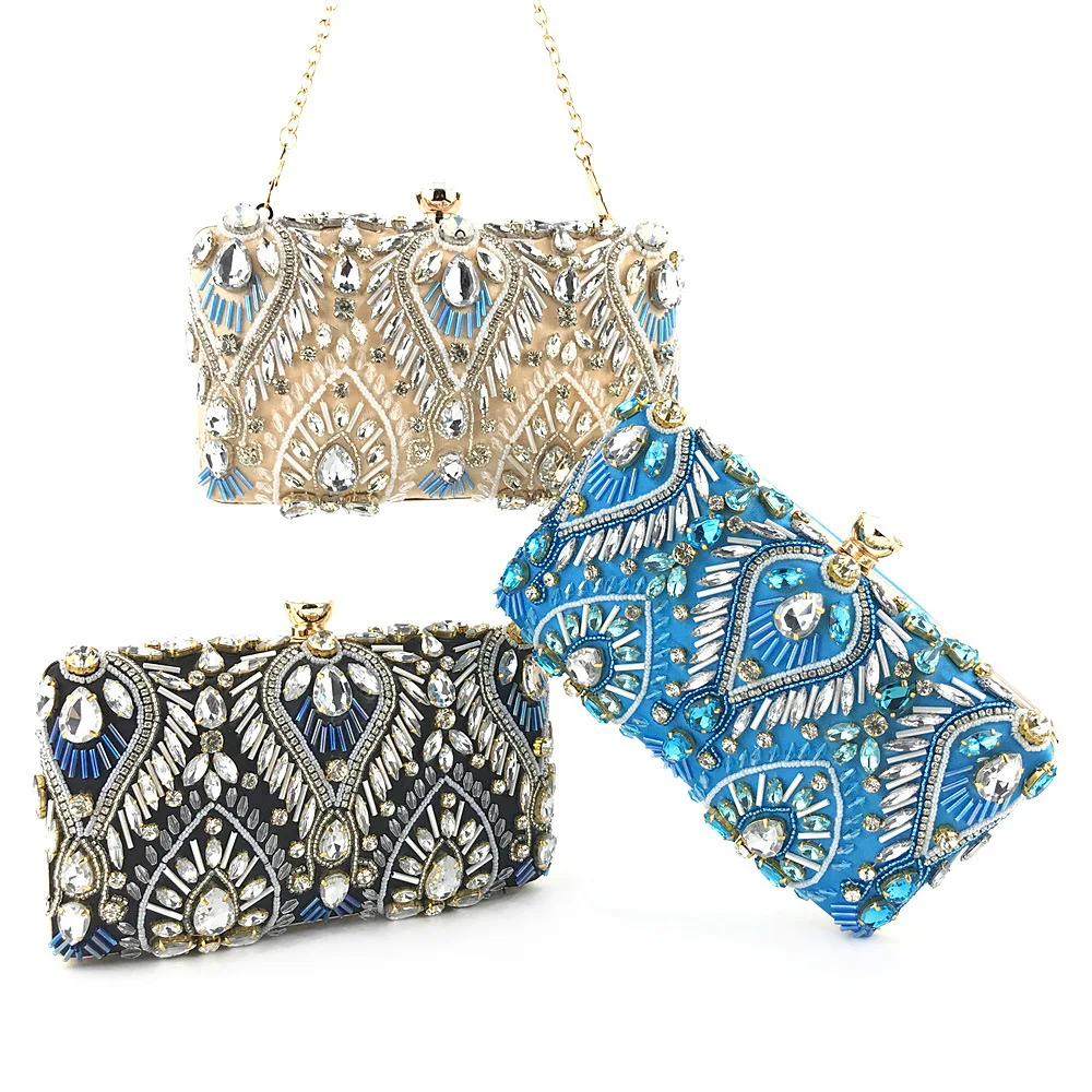 

Heavy beaded embroidery with dinner bag in hand and model runway banquet bag in hand