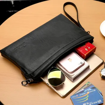 

Simple and fashionable men's handbag in Europe and America large capacity pure soft leather leisure bag carrying bag clip bag