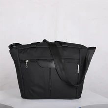 Bolsa para cochecito de mamá, mochila de viaje negra, bolsa de cuidado de bebé de diseñador, bolsa de pañales de maternidad de moda, bolsa de bebé de gran capacidad