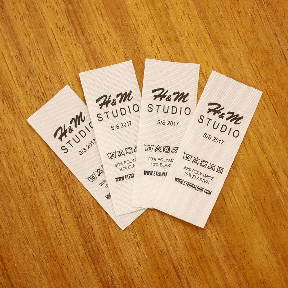 

Швейные этикетки, этикетки для ухода, двойная печать, хлопковые бирки, деловое имя, моющиеся, текст и символ, 25 мм x 70 мм (MD5103)