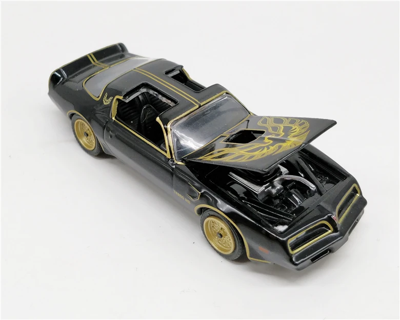 Greenlight 1:64 Pontiac 1977 T/A Smokey без коробки| |