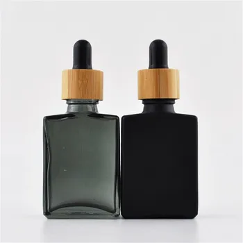 

Luxury Bamboo wooden lid 15ml 30ml 50ml French Square Rectangle Clear/black matte glass dropper bottle with white rubber 1oz