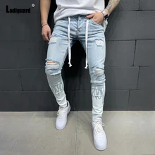 Pantalones vaqueros de talla grande 3xl para hombre, pantalón de mezclilla de moda, pitillo, rasgados con agujeros, informales, empalmados, primavera 2022