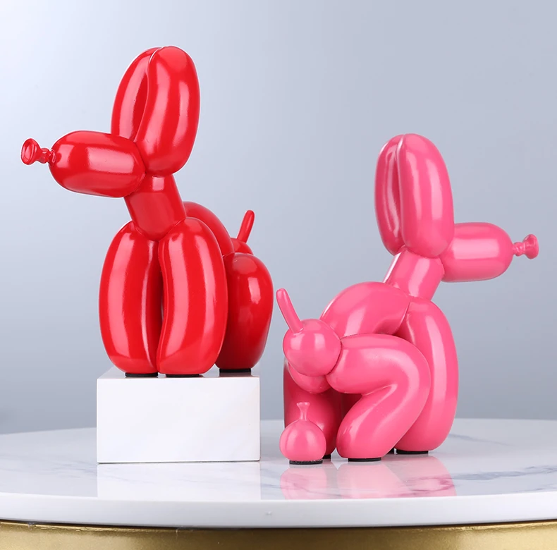 balloon dog pooping sculpture red