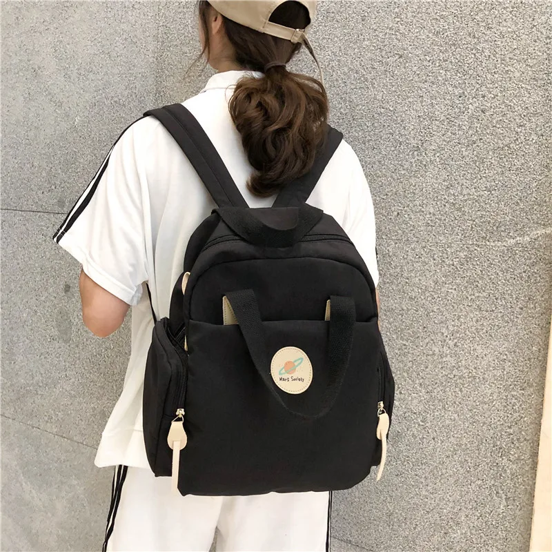 

New style backpack ladies backpack solid color ladies shoulder bag fashion school bag cute cartoon multi-purpose campus backpack