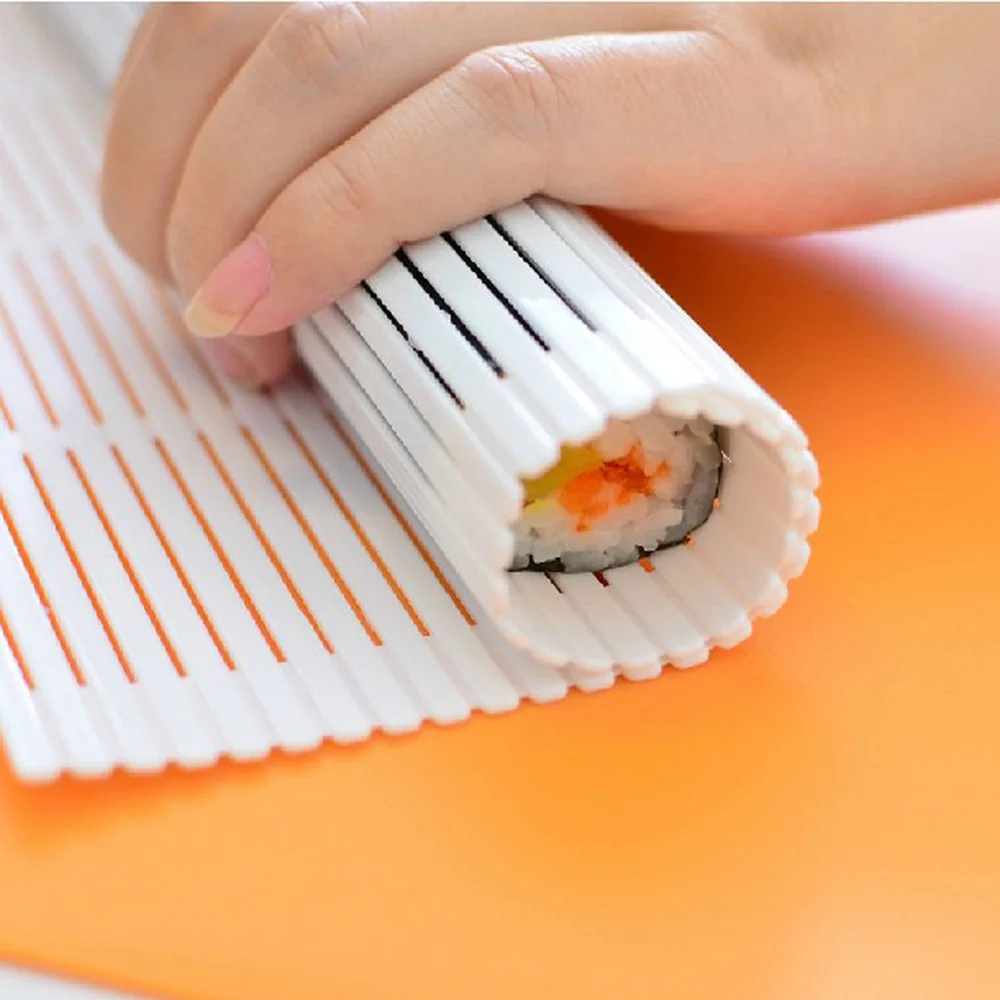 New Portable Sushi Roller Handworking DIY Sushi Mold Kitchen Tools Mannual Plastic Sushi Rolling Mat Reusable:  Model Number: Vegetable Meat Rolling To Type: Sushi Tools Material: Plastic Certification: CE / EU Certification: FDA Certification: LFGB Feature: Eco-Friendly Feature: Stocked Sushi Tools Type: Sushi Molds Feature 1: Moedor De Carne Feature 2: Sushi Tool 