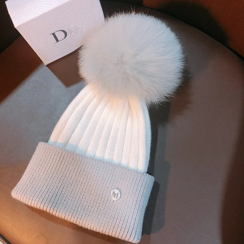 

Japan custom M label winter warm knit hat women autumn and winter stand versatile fox wool ball lovely wool hat