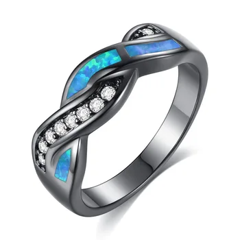 

CAR023 Black-gold wavy blue Aobao and wavy white diamond cross rings