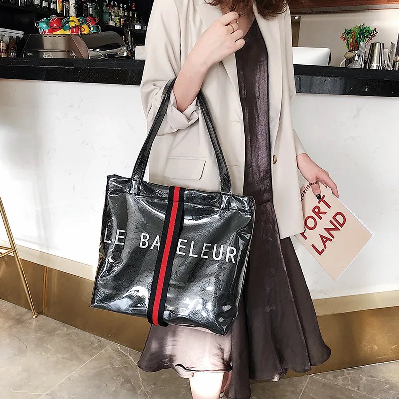 

2019 transparent Kraft paper solid color tote bag large capacity leisure hand-held bright face portable bag tide
